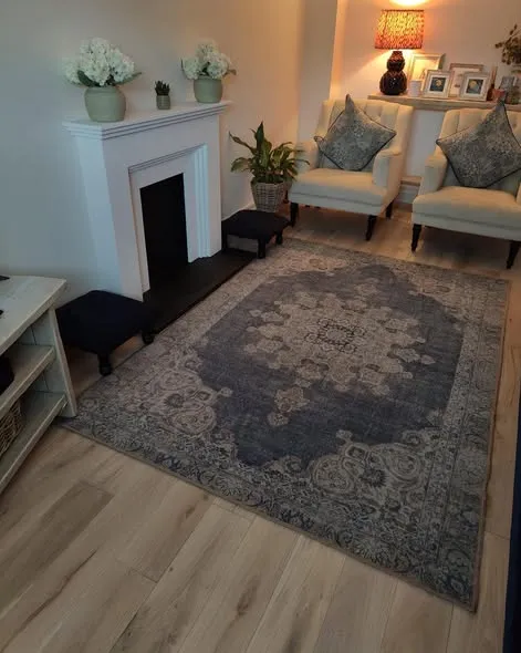 Living room with natural oak flooring fitted by J&J Joinery